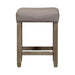 Parkland Falls Console Stool in Weathered Taupe - Furniture 4 Less (Jacksonville, NC)