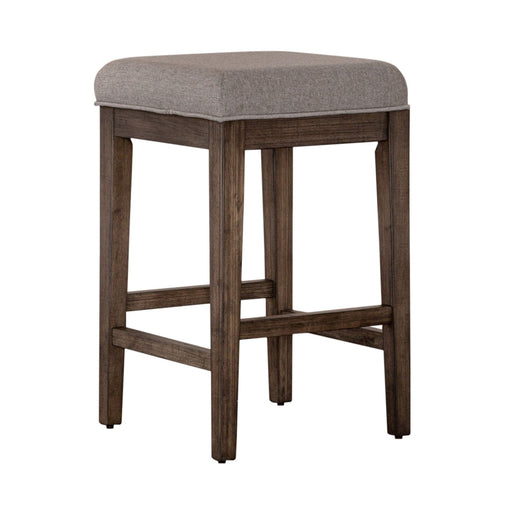 Arrowcreek Upholstered Console Stool in Weathered Stone - Furniture 4 Less (Jacksonville, NC)