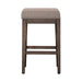 Arrowcreek Upholstered Console Stool in Weathered Stone - Furniture 4 Less (Jacksonville, NC)
