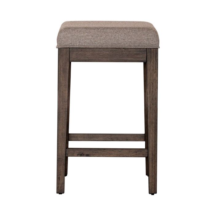 Arrowcreek Upholstered Console Stool in Weathered Stone - Furniture 4 Less (Jacksonville, NC)