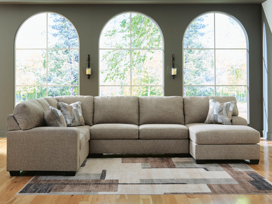 Newellen Sleeper Sectional with Chaise - Furniture 4 Less (Jacksonville, NC)
