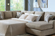 Newellen Sleeper Sectional with Chaise - Furniture 4 Less (Jacksonville, NC)