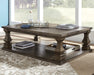 Johnelle Coffee Table - Furniture 4 Less (Jacksonville, NC)