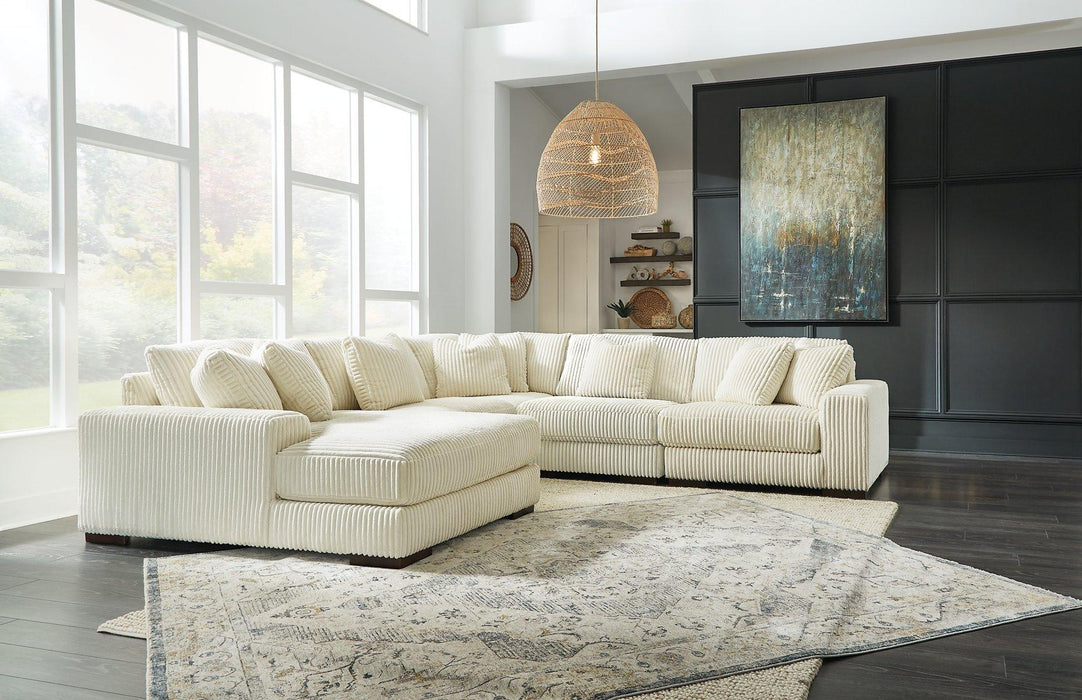 Lindyn Sectional with Chaise - Furniture 4 Less (Jacksonville, NC)