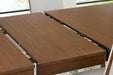 Lyncott Dining Extension Table - Furniture 4 Less (Jacksonville, NC)