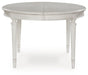 Montelaine Dining Extension Table - Furniture 4 Less (Jacksonville, NC)