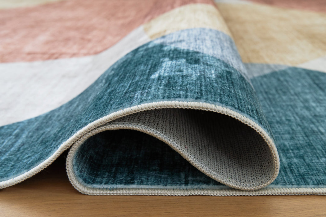 Chanleigh Washable 7'6" x 9'6" Area Rug - Furniture 4 Less (Jacksonville, NC)