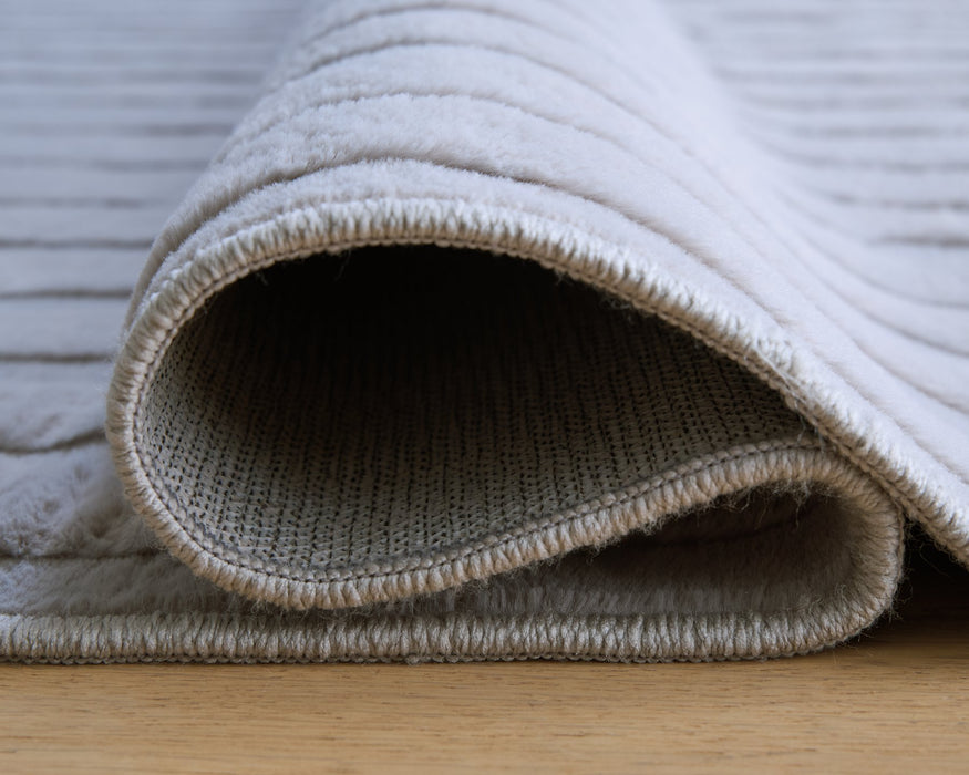 Worthley Washable Area Rug - Furniture 4 Less (Jacksonville, NC)