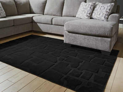Gibbswell Washable 5' x 7' Area Rug - Furniture 4 Less (Jacksonville, NC)