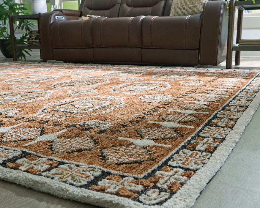 Qaabiz Area Rug - Furniture 4 Less (Jacksonville, NC)